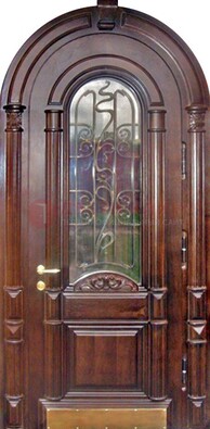 Арочная металлическая дверь массив со стеклом и ковкой ДА-50 в Шатуре