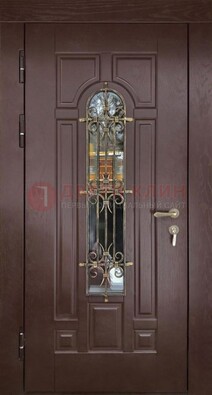 Темная железная дверь со стеклом и ковкой для частного дома ДСК-156 в Шатуре