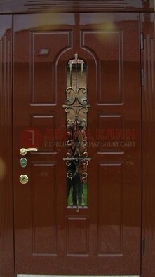 Красивая металлическая дверь со стеклом и ковкой ДСК-33 в Шатуре