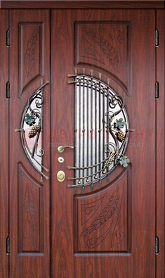 Железная дверь с виноритом и стеклом с ковкой ДВТ-170 в Шатуре